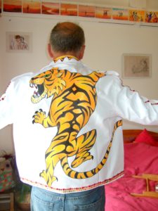Tiger design painted on jacket for Brighton Fringe show