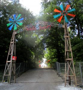 Whistlers Green entrance sign 1, Boomtown Fair 2018